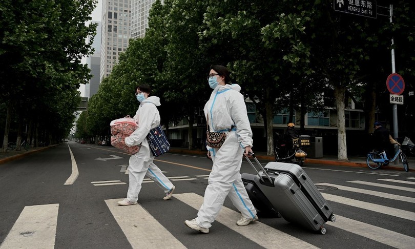 cina covid lievi allentamenti pechino guangzhou